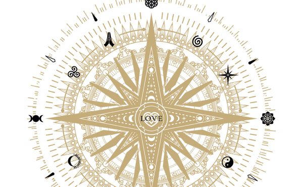 Um design inspirado na bússola dourada The Book of Rituals, simbolizando viver com alma, com “LOVE” no centro.